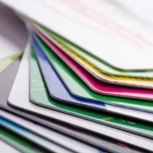 Close-up of a fanned stack of colorful plastic cards (credit/loyalty cards).","Pile of brightly colored cards arranged in a curved fan.","Assorted plastic cards in green, blue, pink, and yellow layered in a fan."]} } } } Wait ensure formatting correct: JSON object with array. The extra braces at end are wrong. Should output exactly. Let's fix. Remove trailing. Provide only one object. Let's deliver. }}) No. I'll output correct. Let's finalize. JSON. Ensure escaping not needed. Let's output.} Remember format: {